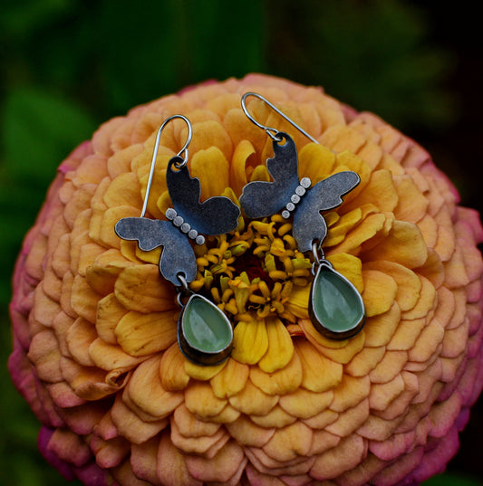 Butterfly earrings, sterling silver and peridot